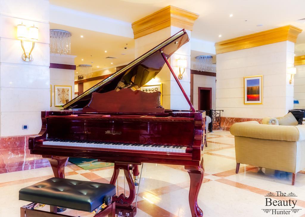 Tolip Hotel Alexandria Exterior foto Piano in the lobby